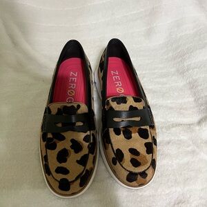 Cole Haan ZeroGrand animal print loafers.